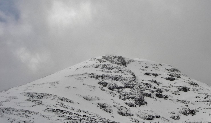 North side of Meall a Ghuithais with large cornice and ice re-forming