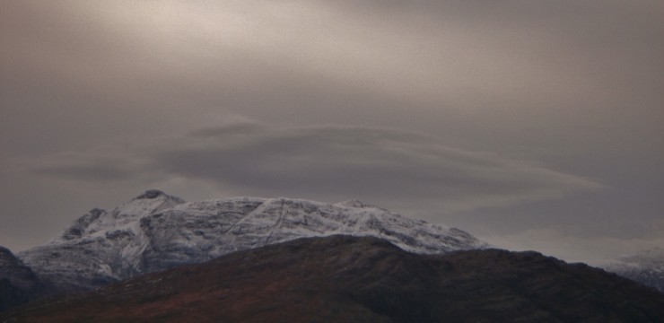 Lenticular cloud cap on Ben Damph - winds due to increase in strength overnight.