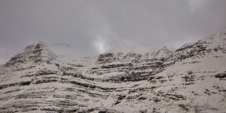 Spindrift blowing off the summit of Liathach onto southerly aspects.