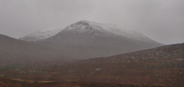 Fresh snow line on the north top Beinn Liath Mhor Fannaich (870m) 