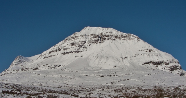 Liathach. Some sun induced single point avalanches start immediately  the ridge and gather to a significant size. 