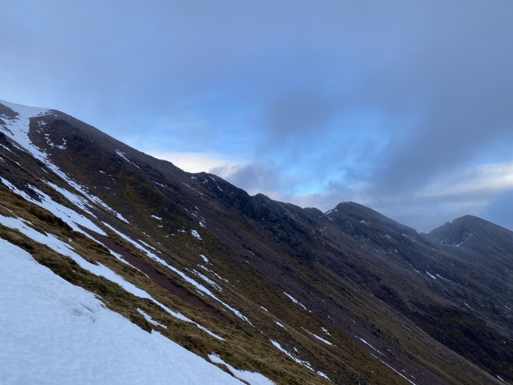 The South side of Beinn Eighe ridge from Spidean Coire Nan Clach, over Sgurr Ban to Sgurr nan Fhir Duibhe and the Black carls in the distance.