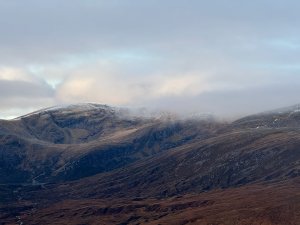 Views between the clouds in the Fannichs