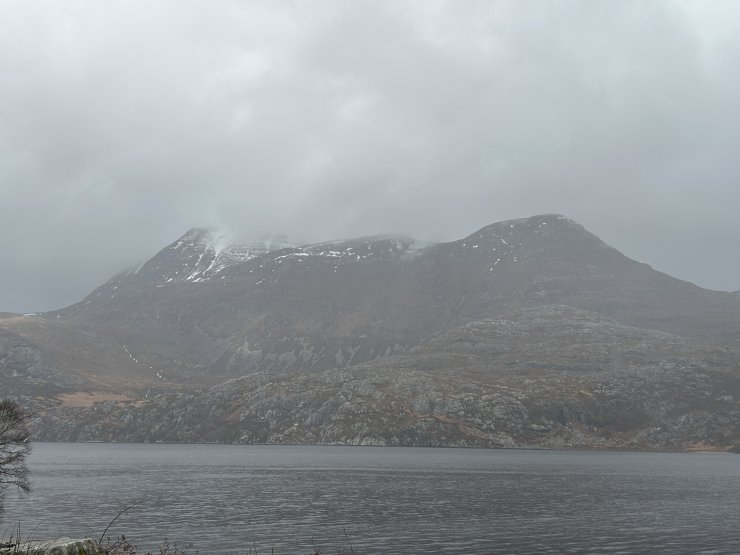 A murky Slioch, with the snowline receding.