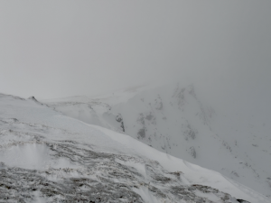 Snow showers on Fionn Bheinn